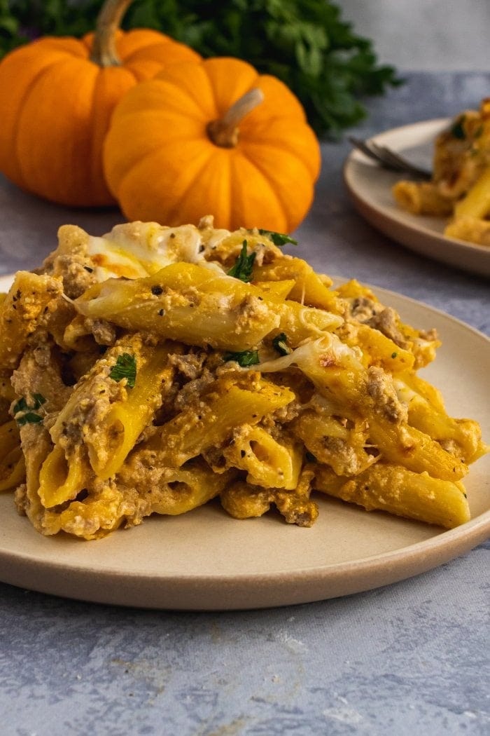 Cheesy and creamy ricotta pumpkin pasta on a plate.