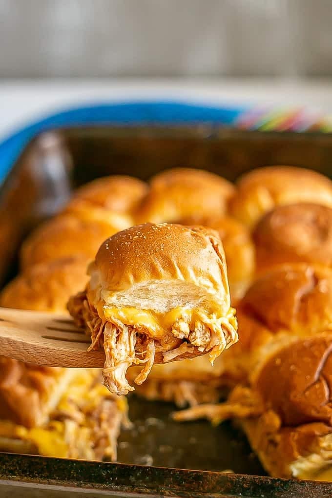 Brioche buns filled with tangy BBQ coated shredded chicken and melty cheese and brushed with butter