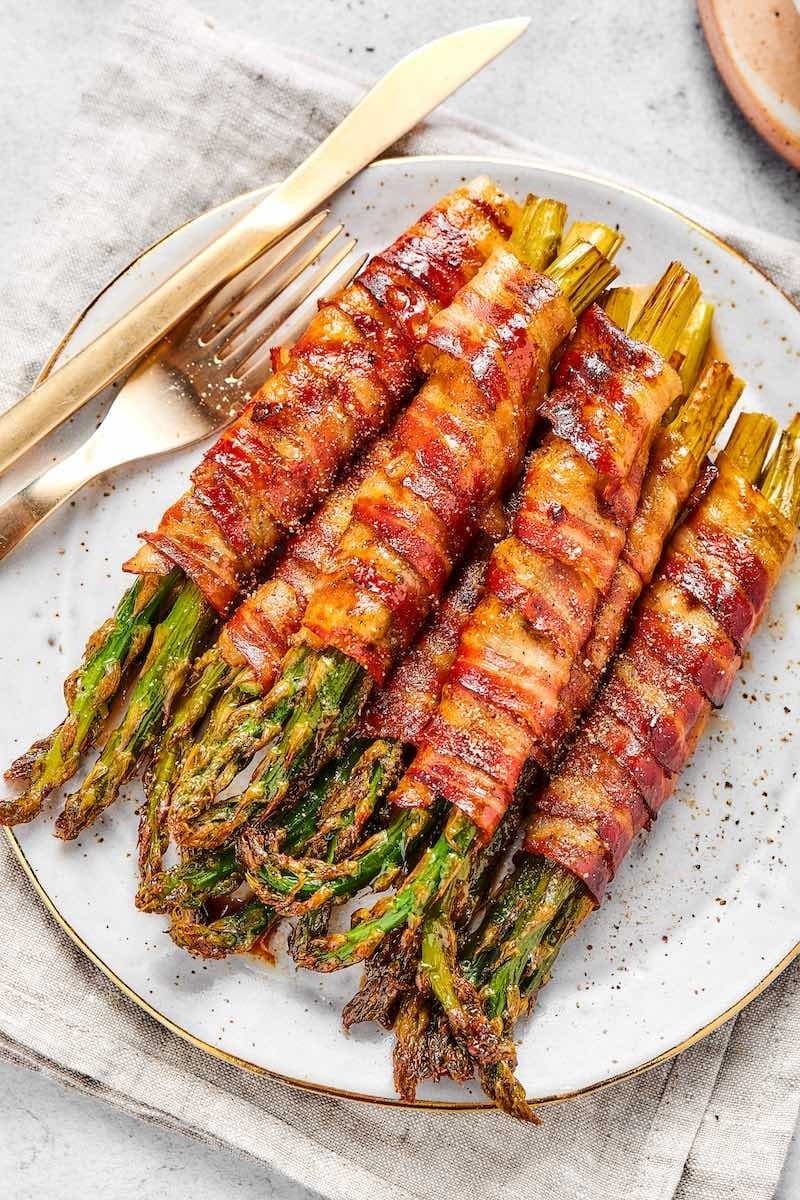 Asparagus wrapped with bacon strips. 