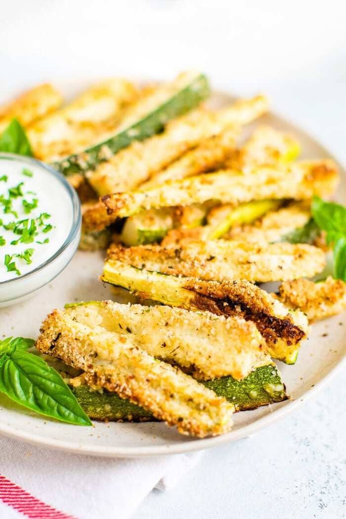 Baked zucchini fries breaded with almond flour and parmesan