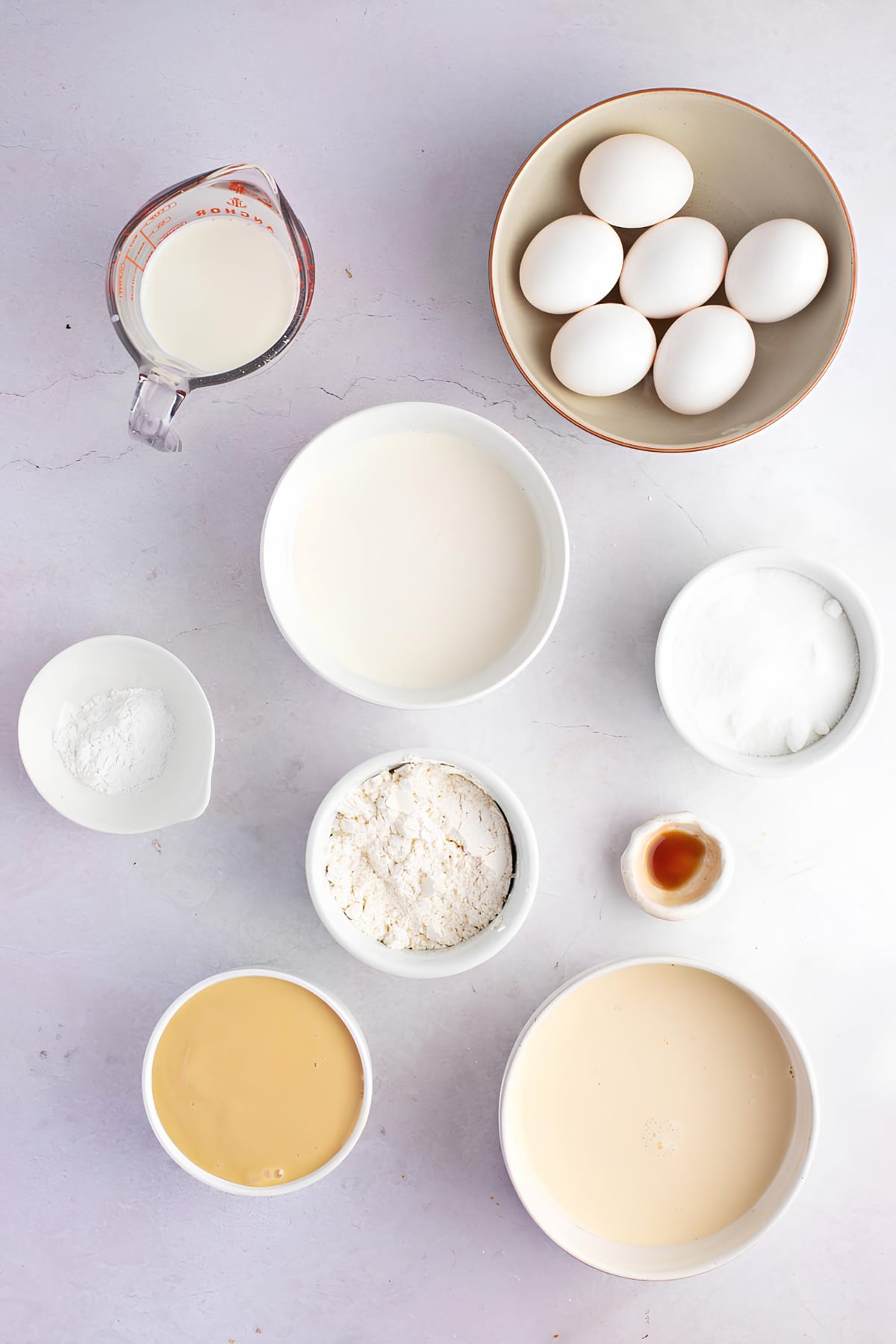 Pastel De Tres Leches Ingredients - Flour, Eggs, Sugar, Baking Powder, Milk, Vanilla Extract and Fresh Berries