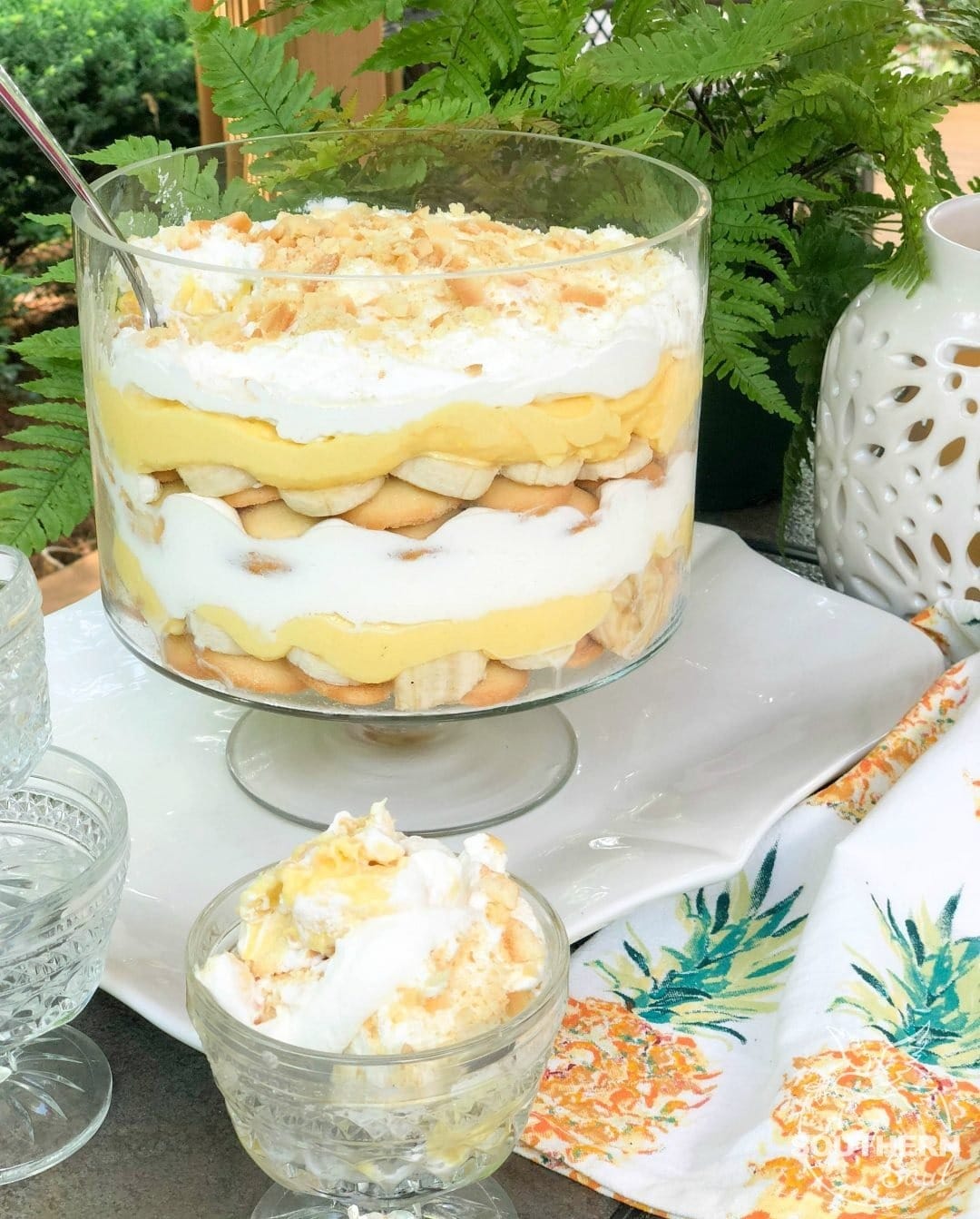 Banana pudding made with with bananas, cookies, pudding, and fresh whipped cream. 