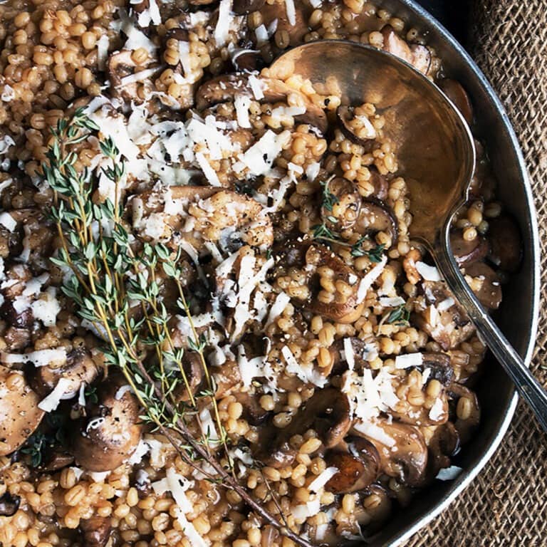 Barley cooked risotto style, with lots of mushrooms and Parmesan cheese.