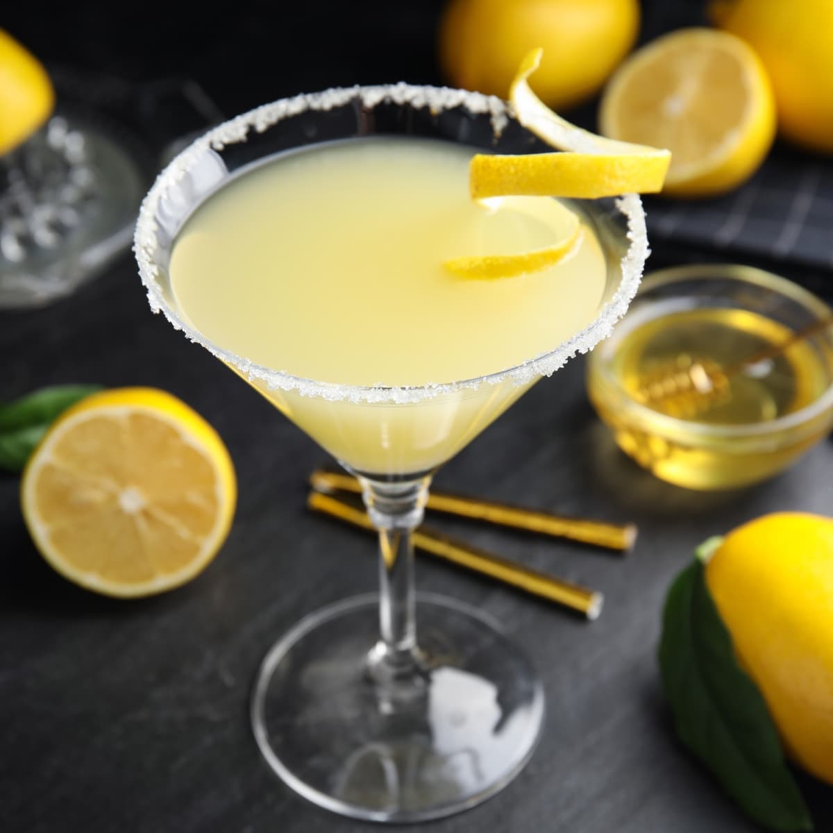 Bright and Slightly Sweet Bee's Knees Cocktail with Lemon Garnish