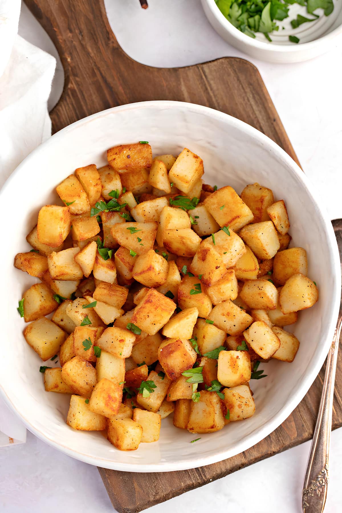 Bowl of Home Fries with Butter, Salt and Pepper 