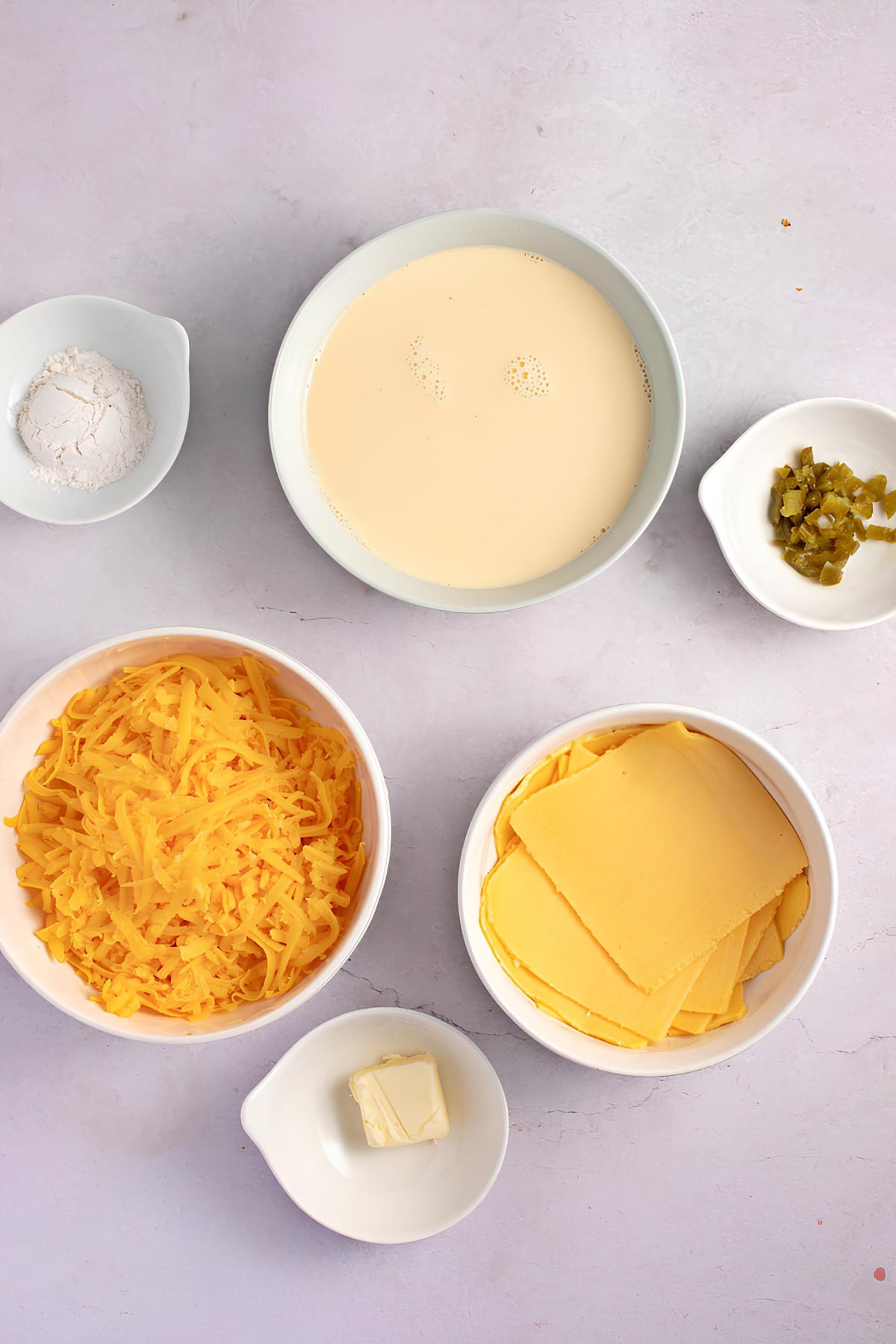 Nacho Cheese Sauce Ingredients: Butter, Flour, Milk, Cheese and Pickled Jalapenos