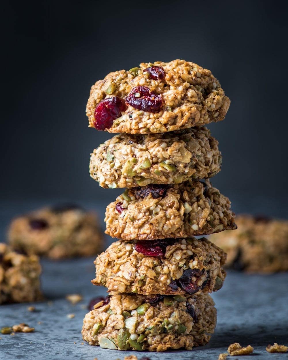 Stacked oatmeal cookies with berries. 