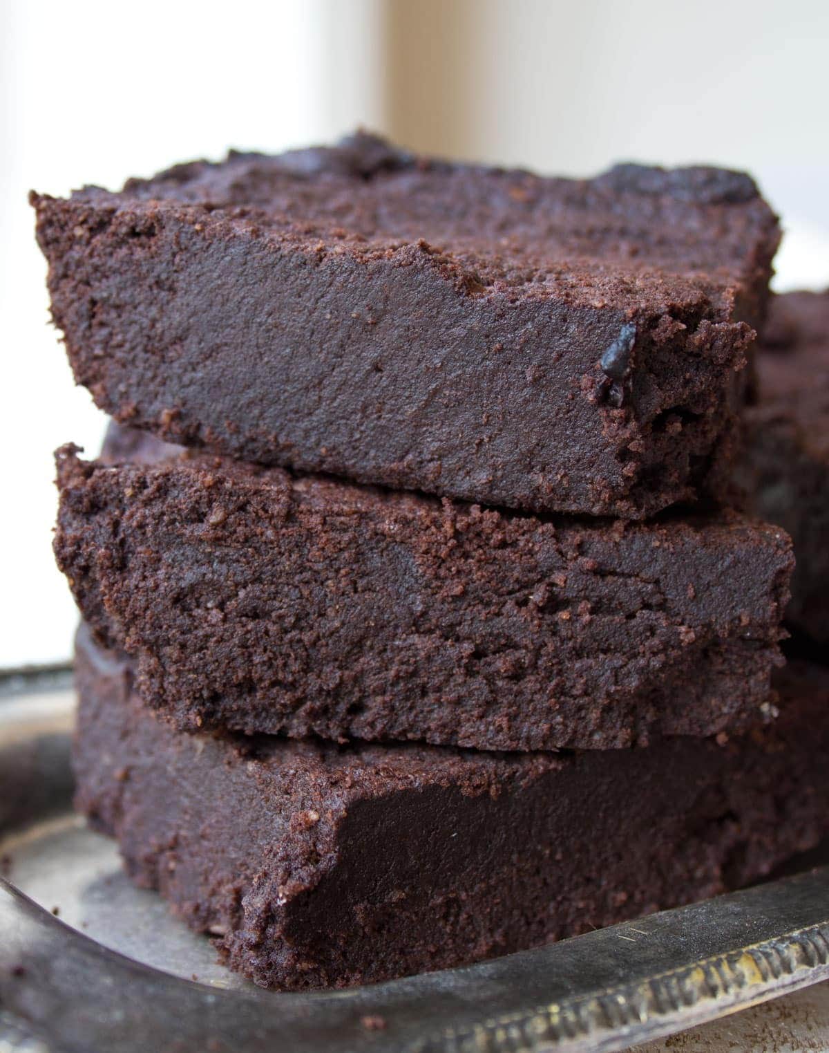 Stacked slices of chocolate brownies. 