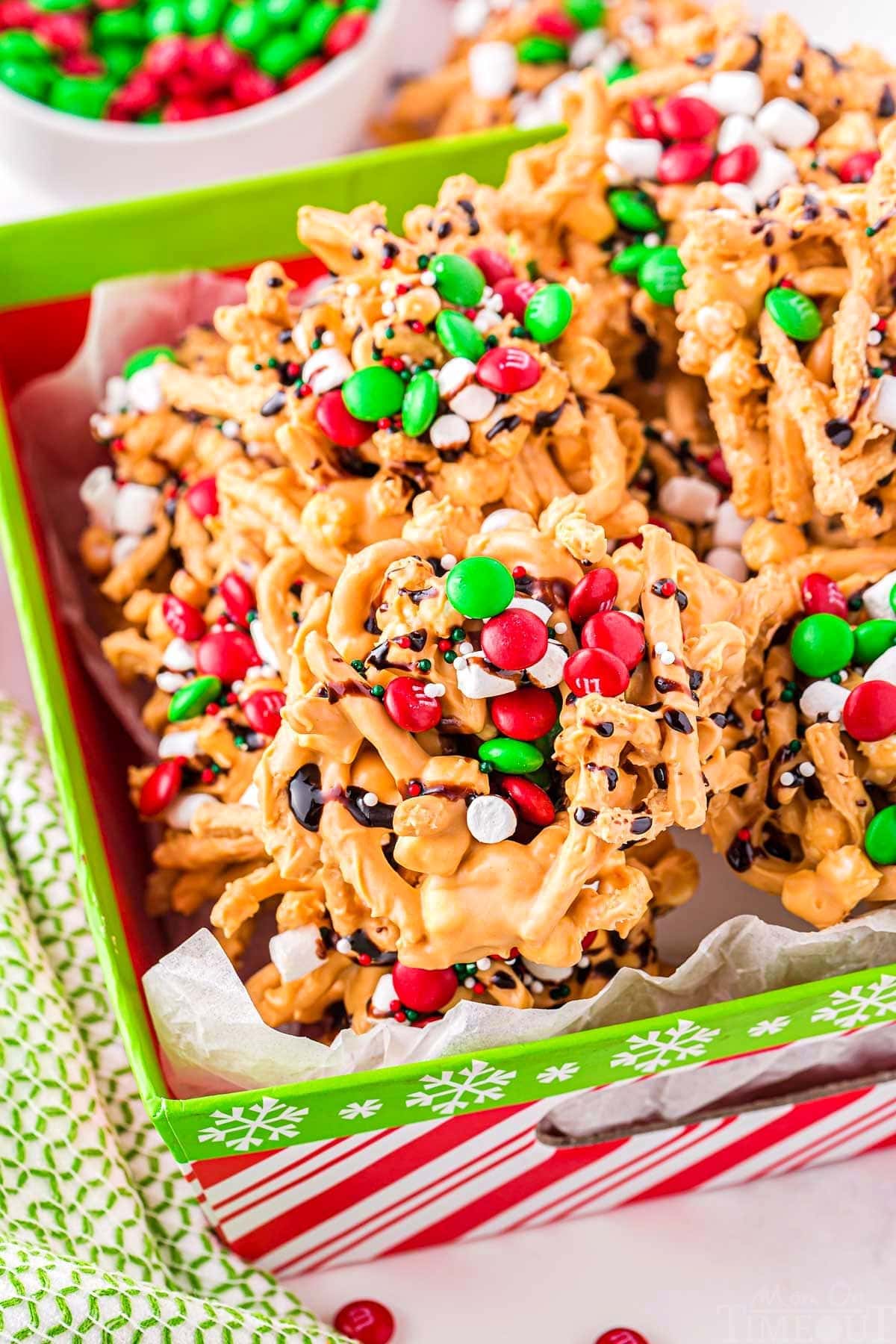 Cookies Piled high with marshmallows, chocolate syrup, sprinkles, and M&Ms.