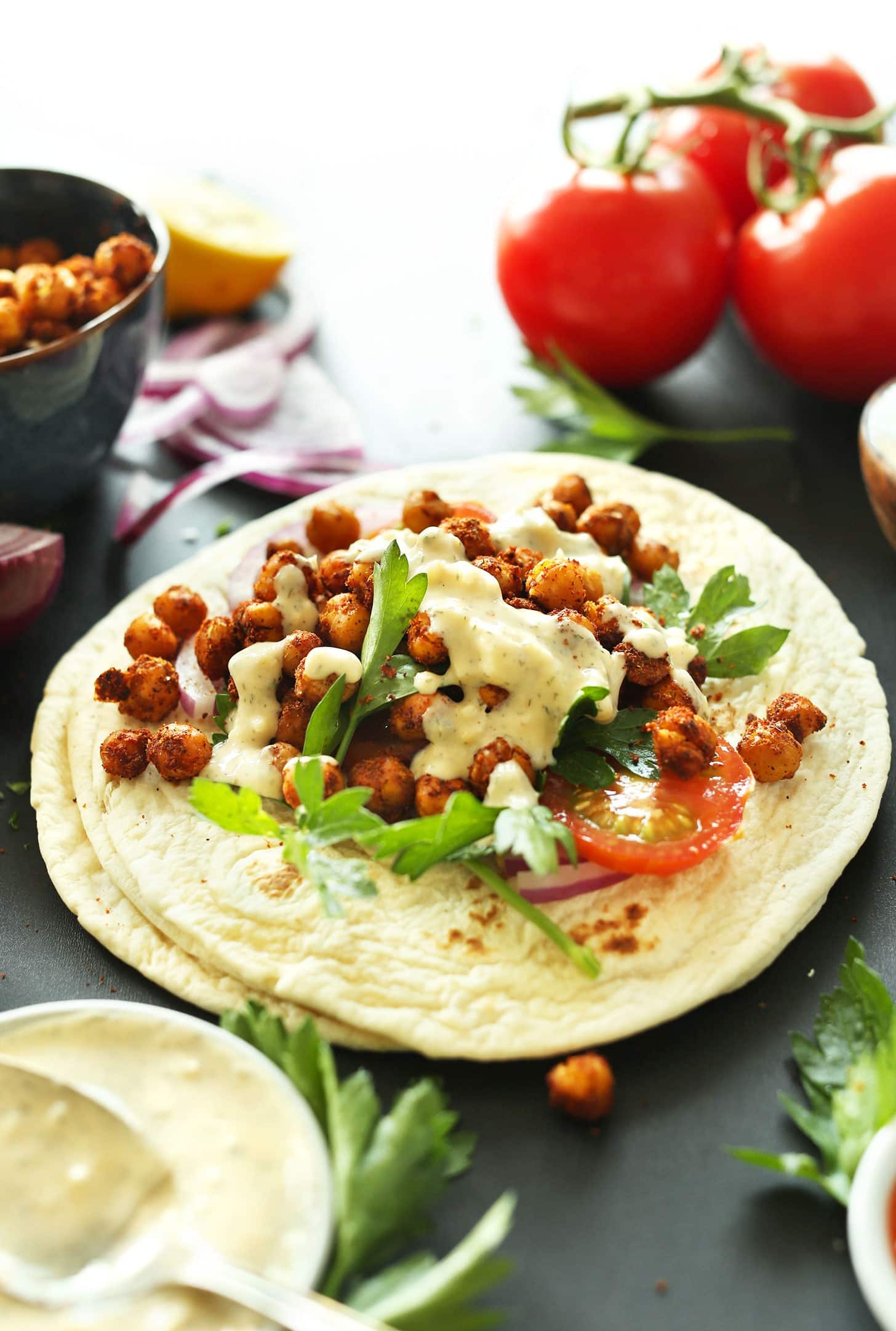 Chickpea Shawarma Sandwich with parsley and tomatoes