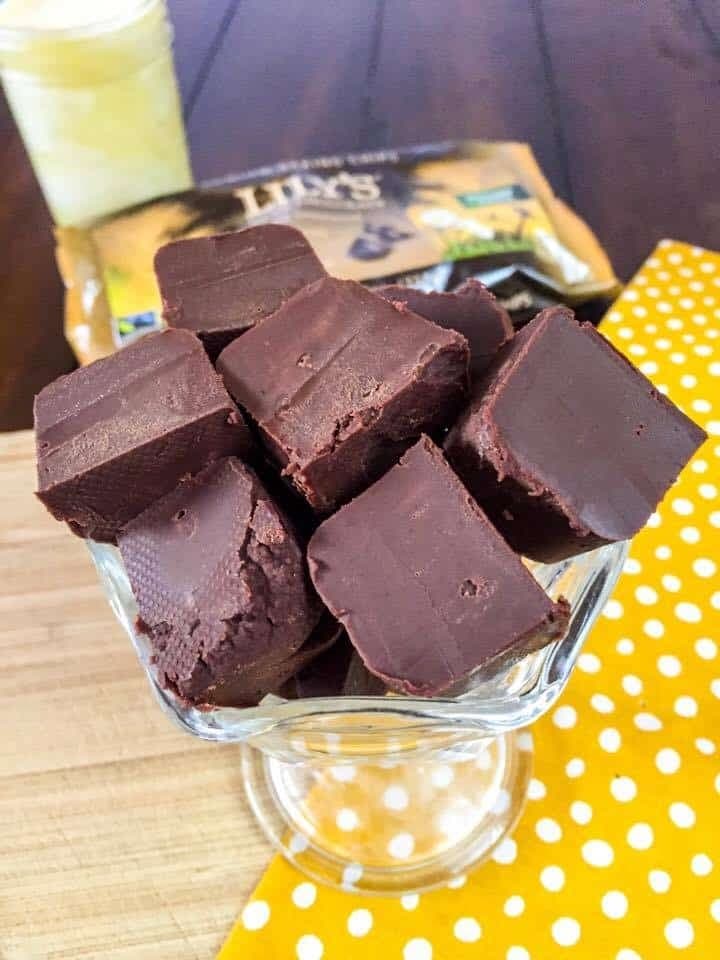 Bunch of chocolate fudge in a glass tray.
