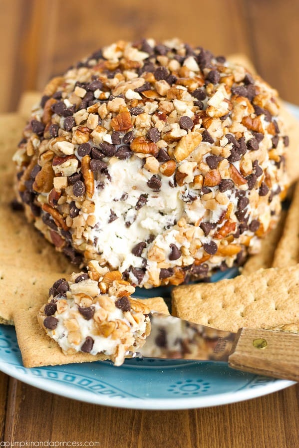 Cheeseball coated with  miniature chocolate chips, toffee pieces, and pecans served with crackers. 