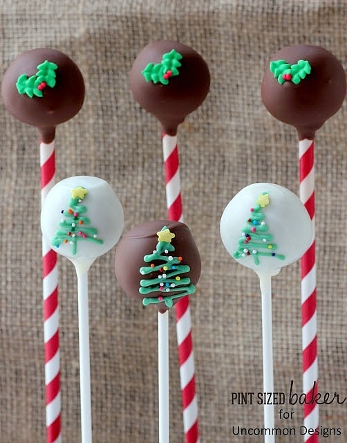 Cake pops on stick with Christmas tree designs. 