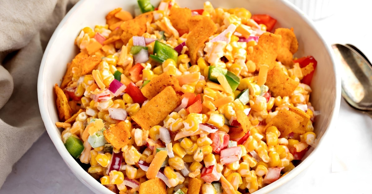 Colorful Bowl of Frito Corn Salad with Onions, Red and Green Peppers