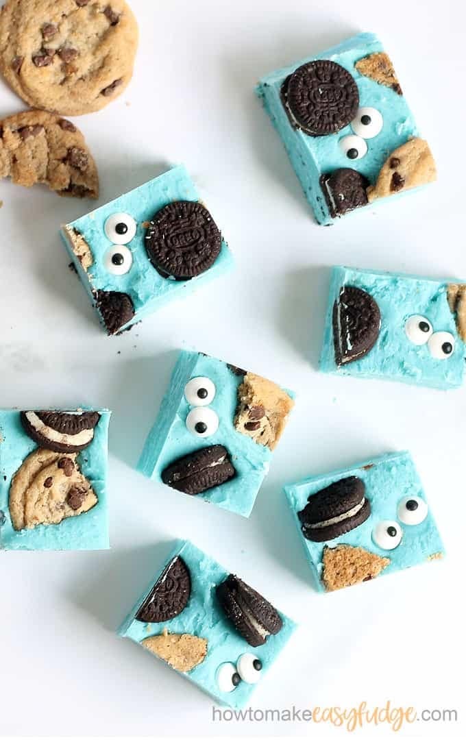Bright blue fudge with chopped cookies and candy eyes decoration. 
