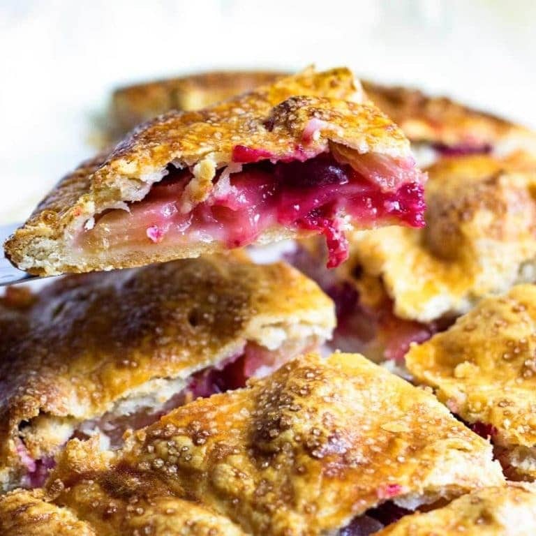Apple slab pie with cranberry jam filling and flaky toppings. 