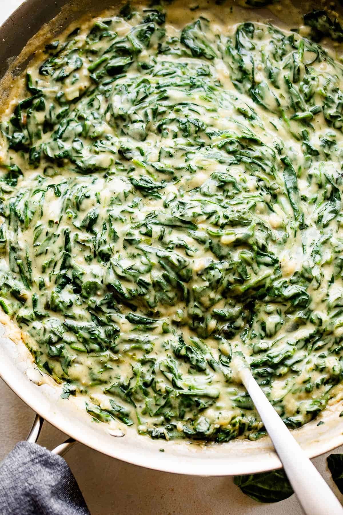 Creamy spinach in a pan. 
