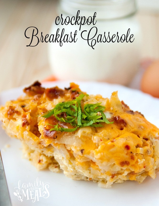 A serving of cheesy breakfast casserole on a plate.