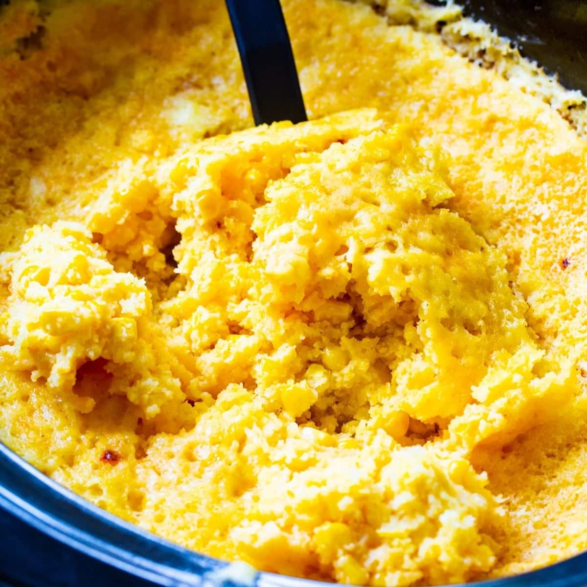 Corn casserole tossed in a slow cooker.