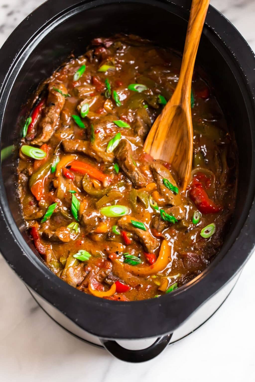 Crockpot Pepper Steak with bell peppers, diced tomatoes and green onions