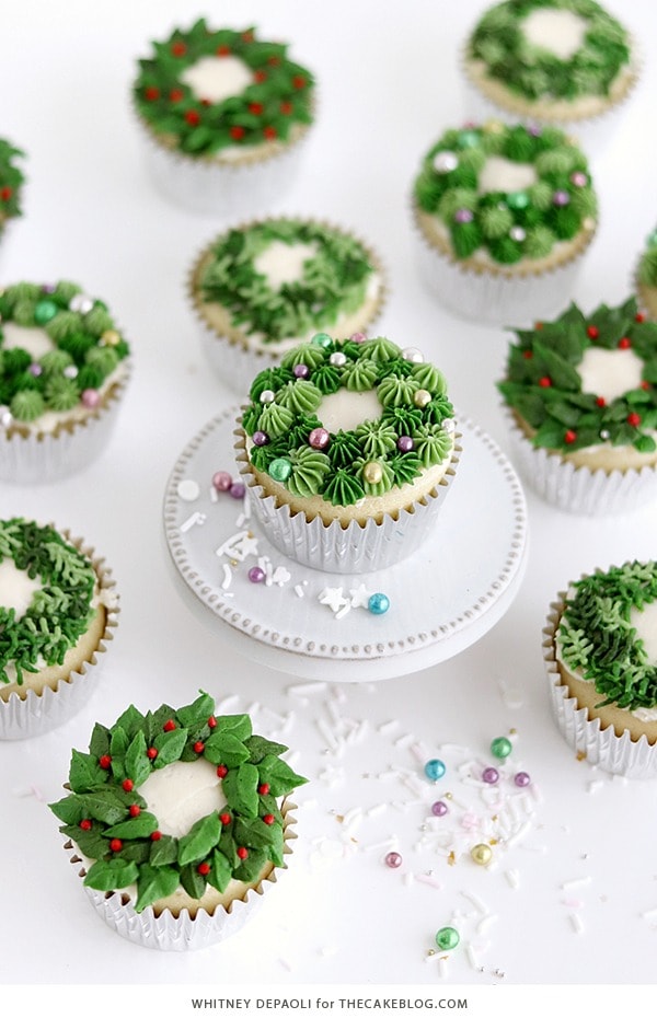 Cupcakes topped wit leaves shaped frosting piping.