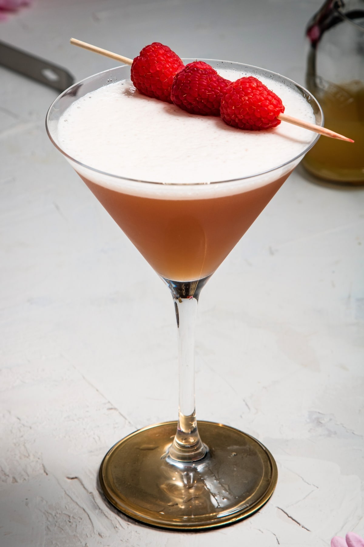Homemade French Martini with Raspberries in a Wine Glass