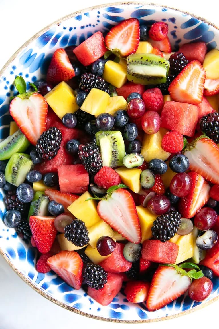 Mixed fresh fruits on a bowl.