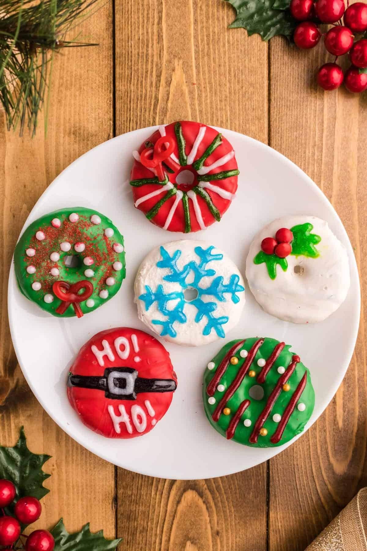 Christmas holiday inspired cookies decorated with frosting and candies. 
