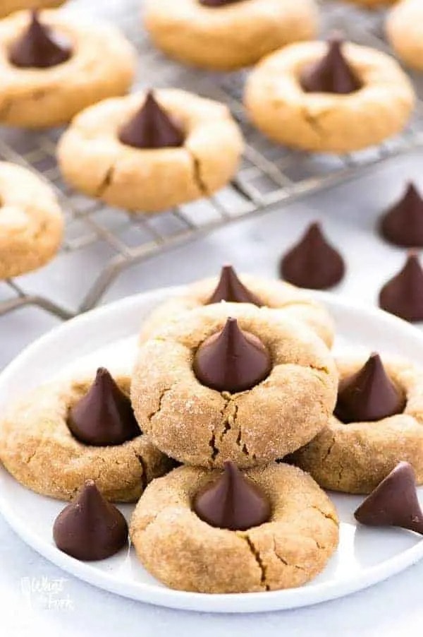 Bunch of cookies topped with a Hershey’s kiss.