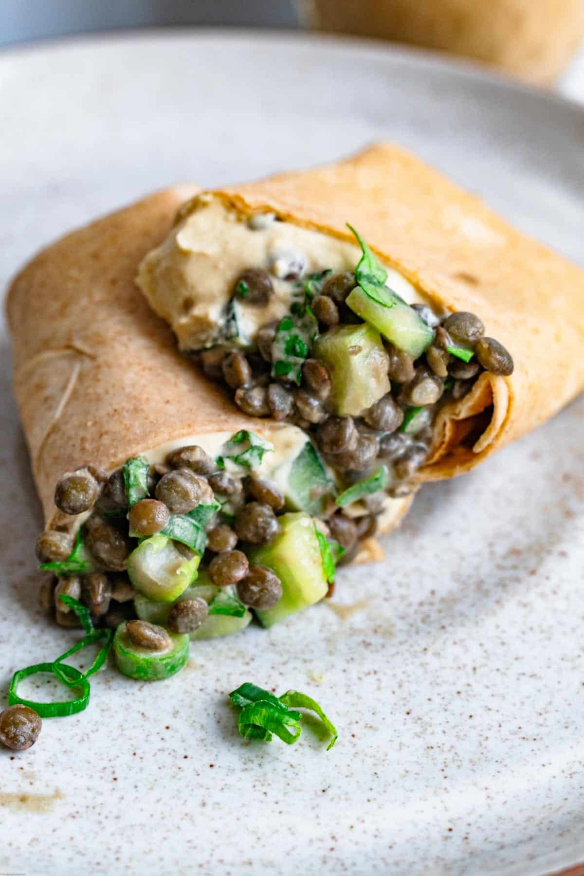 Homemade high-protein lentil salad wraps with cucumbers