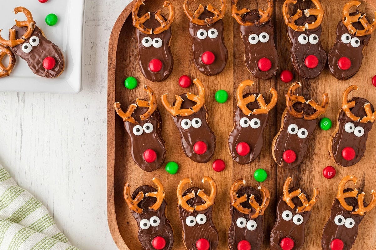 Reindeer inspired cookies on a wooden table. 
