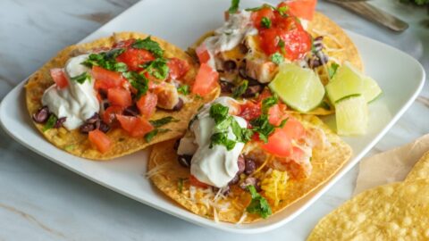 Homemade Mexican Tostada with Lime, Tomatoes and Whipped Cream