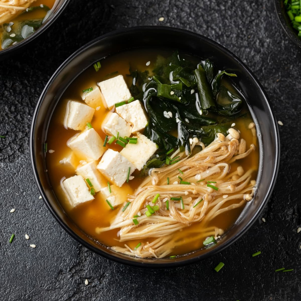 Bowl of Warm Miso Soup with Tofu, Seaweeds and Mushrooms