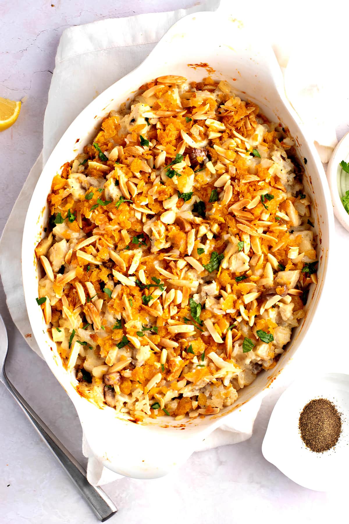 A casserole dish with a delicious blend of rice and tender chicken, cooked to perfection.