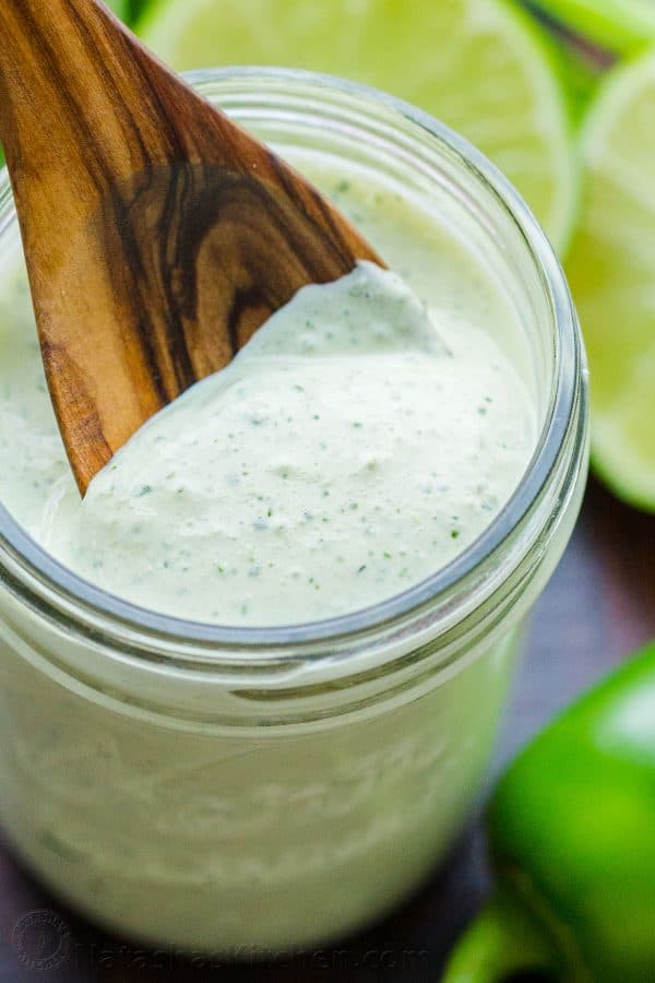 Jalapeno ranch with cilantro and lime juice in a glass jar