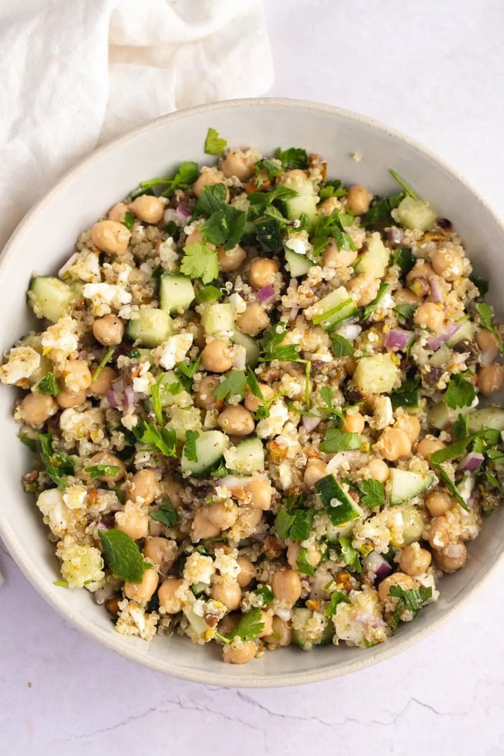 Jennifer Aniston Salad with chickpeas, onion, cucumber, quinoa, parsley, mint and feta cheese