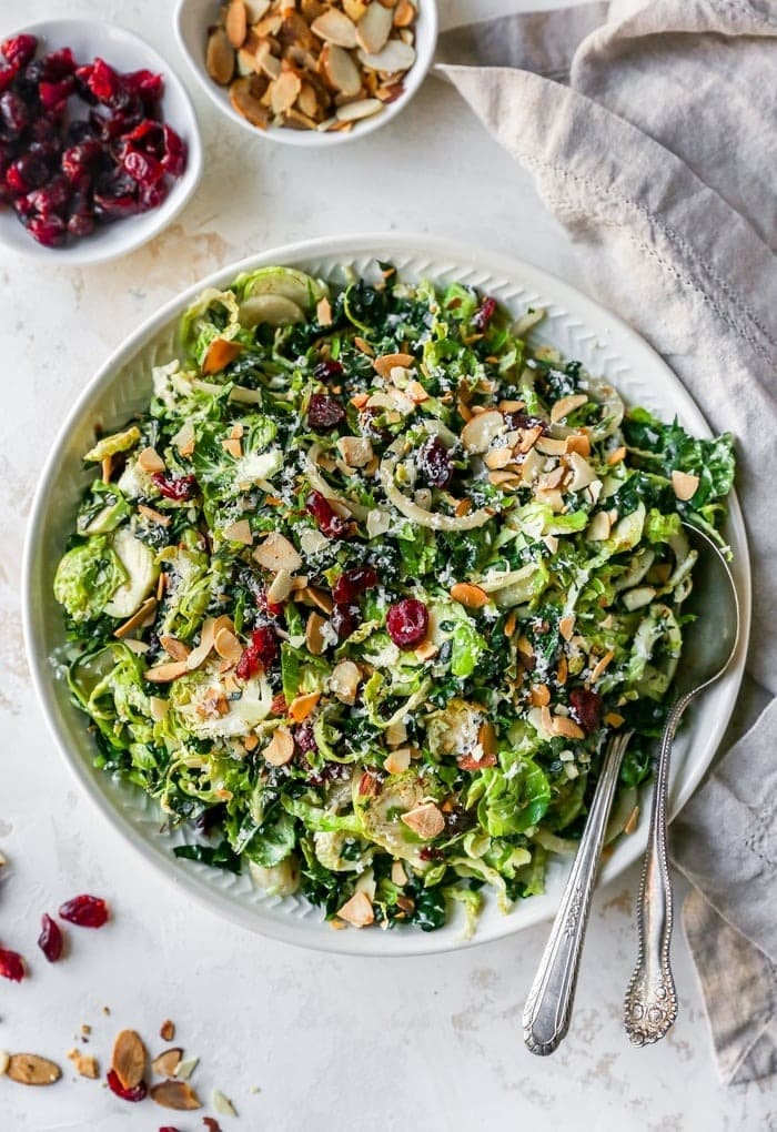 Kale and brussels sprout salad filled with shredded kale and sprouts, cranberries, marinated onions, almonds and pecorino cheese.