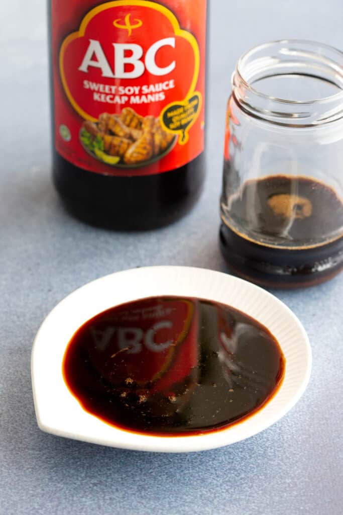 Bowl of Indonesian sweet soy sauce or kecap manis