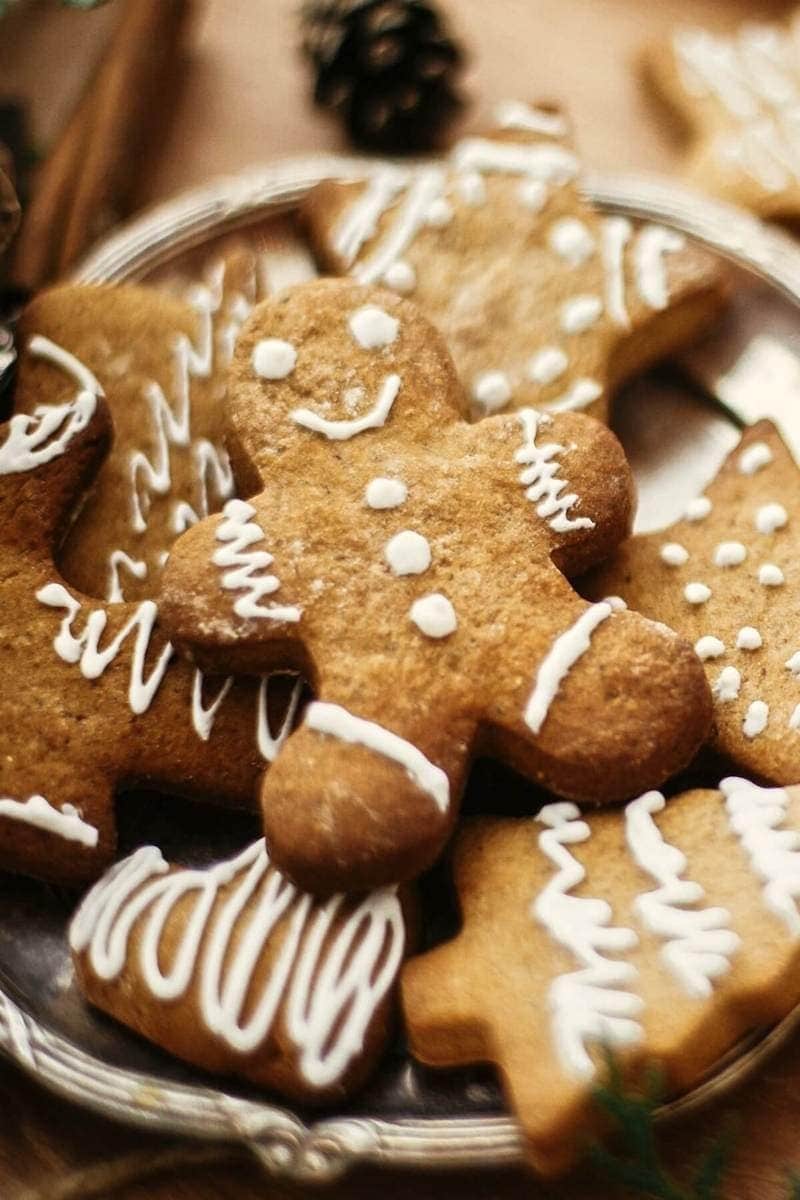 Bunch of gingerbread cookies on a plate.
