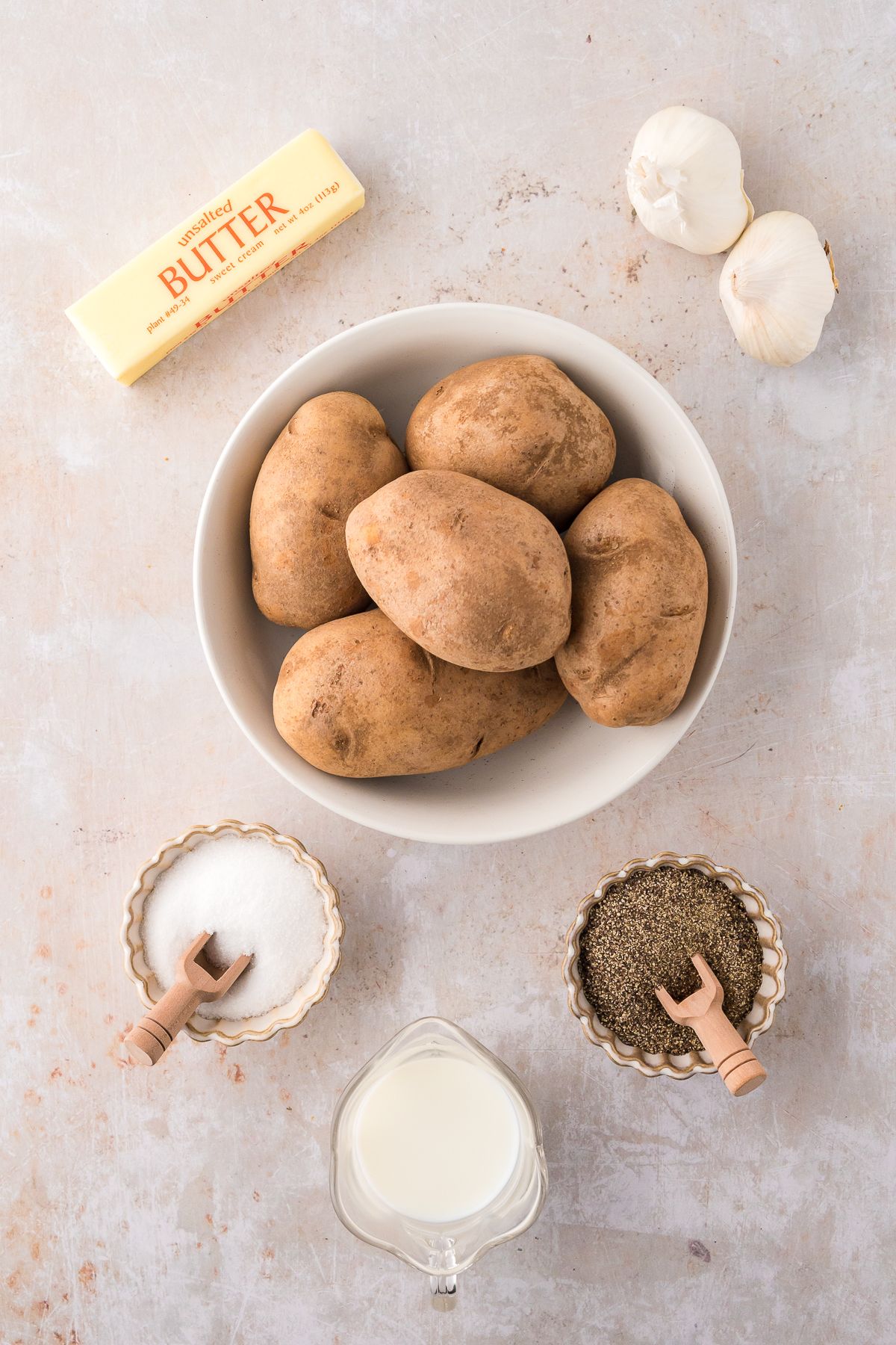 Butter, potatoes, pepper, salt and milk. 