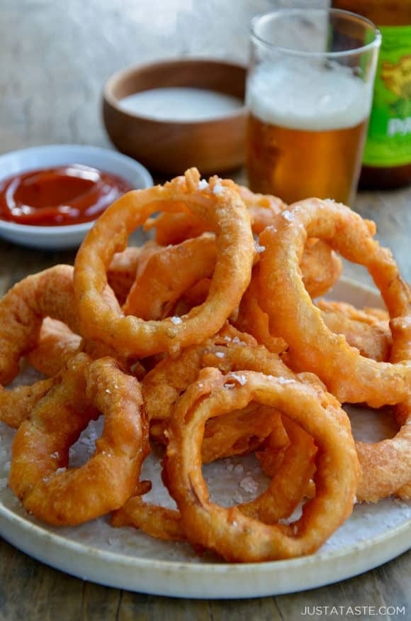 Bunch of onion rings on a plate. 