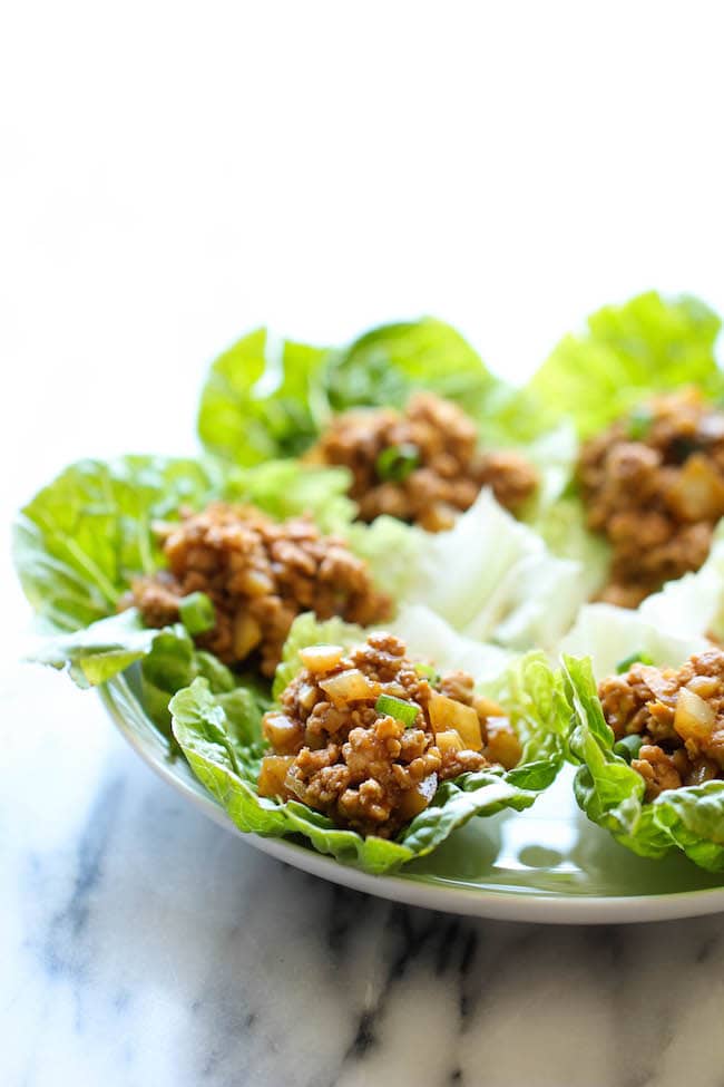 Homemade chicken lettuce wraps with water chestnuts and onions