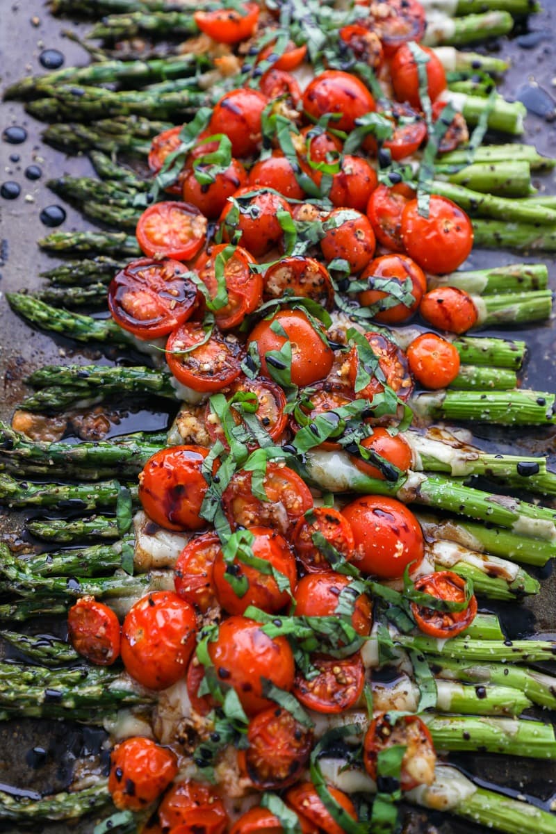 Parmesan roasted asparagus with tomatoes and balsamic sauce. 
