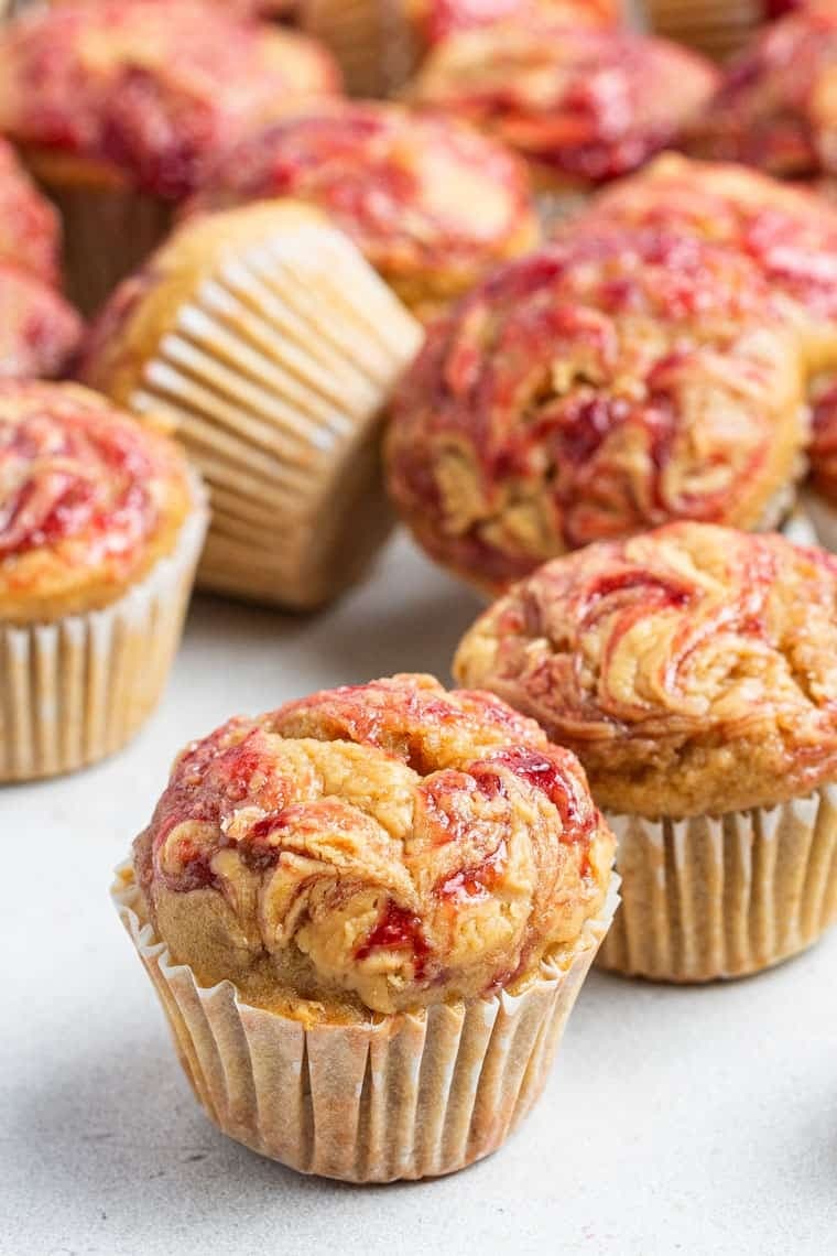 Mini muffins with swirl of jam.