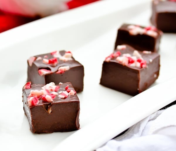 Chocolate fudge with chopped candy cane toppings.