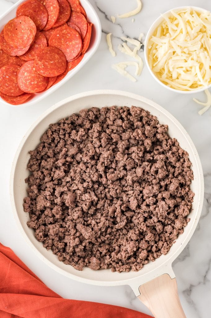 Browned ground beef in a skillet