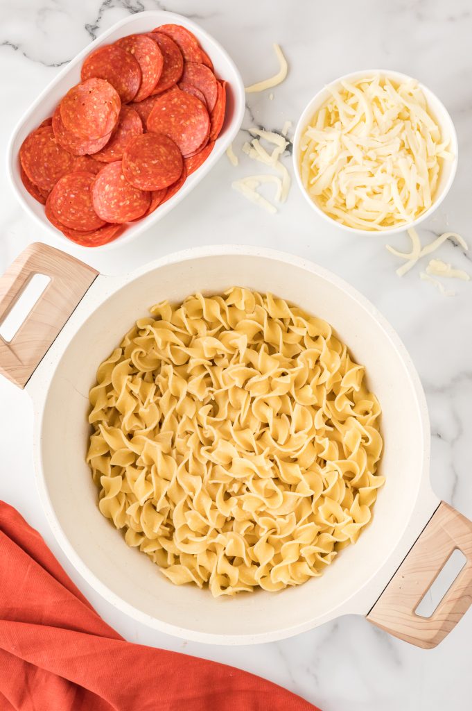 Freshly cooked egg noodles in a pot