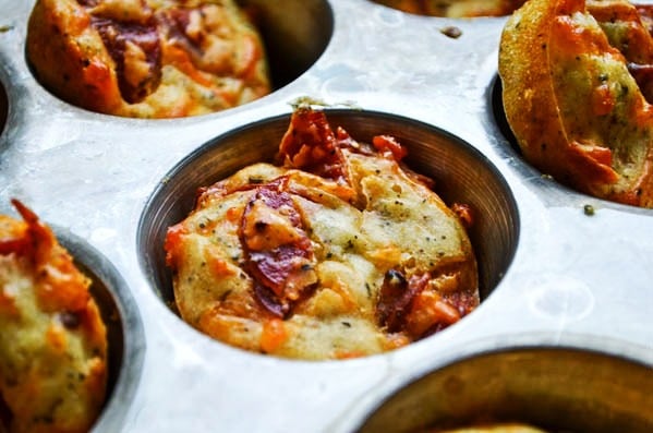 Pepperoni pizza cooked in muffins molders. 