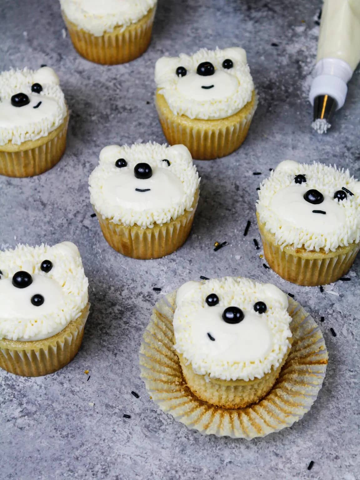 Cupcakes topped with polar bear inspired frosting. 