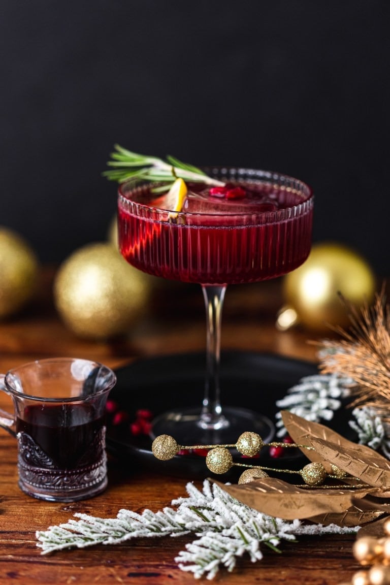 Pomegranate cocktail in Martini glass.
